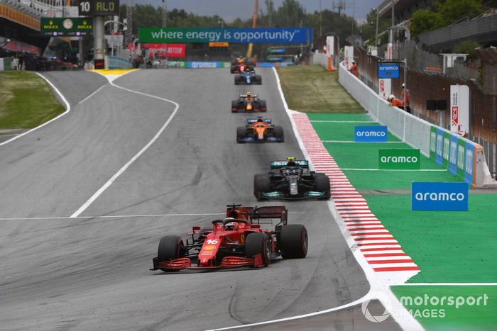 Charles Leclerc, Ferrari SF21, Valtteri Bottas, Mercedes W12, and Daniel Ricciardo, McLaren MCL35M