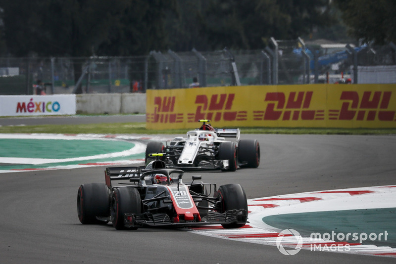 Romain Grosjean, Haas F1 Team VF-18 and Charles Leclerc, Sauber C37