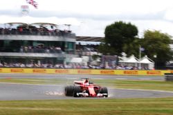 Sebastian Vettel, Ferrari SF70H, runs off the road with a front puncture