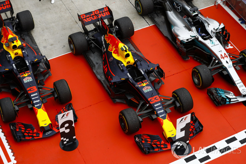 The cars of Max Verstappen, Red Bull Racing RB13, race winner, Lewis Hamilton, Mercedes AMG F1 W08, second place, Daniel Ricciardo, Red Bull Racing RB13, third place, in Parc Ferme