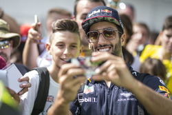 Daniel Ricciardo, Red Bull Racing poses for a selfie photo, the fans
