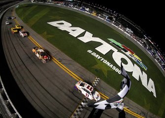 Race winner Denny Hamlin, Joe Gibbs Racing Toyota take the checkered flag