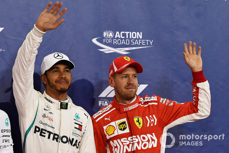 Pole sitter Lewis Hamilton, Mercedes AMG F1, third place Sebastian Vettel