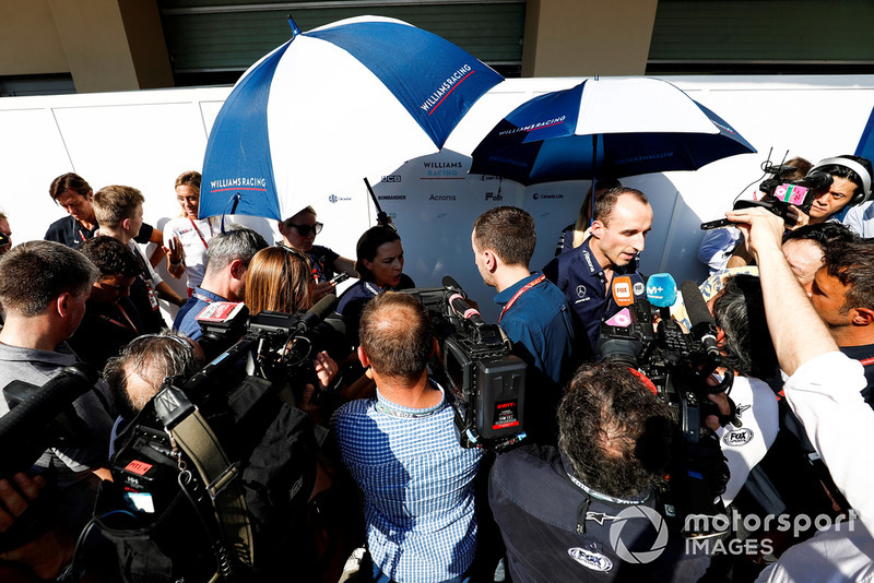 Robert Kubica, Williams Racing, and Claire Williams, Deputy Team Principal, Williams Racing, talks to the press