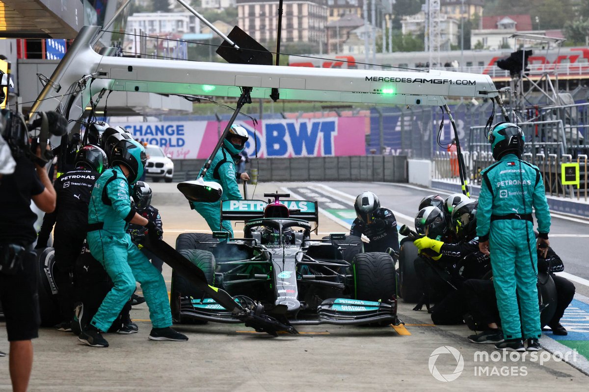 Lewis Hamilton, Mercedes W12, makes a pit stop