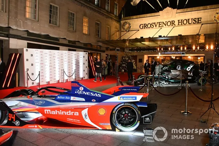 Racing cars on display outside the venue