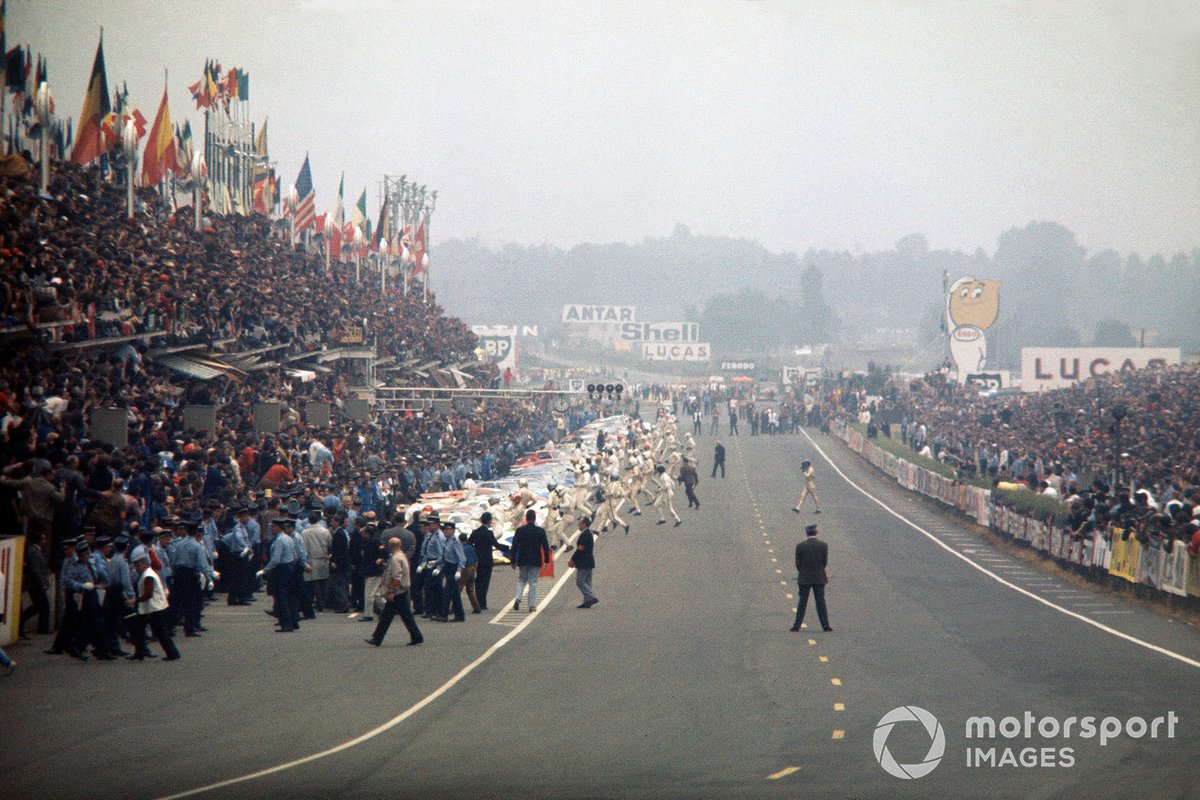 All the drivers make the traditional running start, except for Jacky Ickx who walks across the track in protest