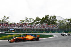 Fernando Alonso, McLaren MCL33, leads Charles Leclerc, Sauber C37