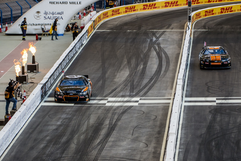 Petter Solberg and Josef Newgarden driving the Whelen NASCAR