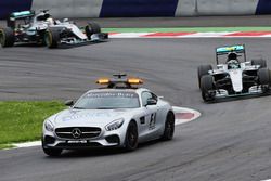 Nico Rosberg, Mercedes AMG F1 W07 Hybrid leads behind the FIA Safety Car