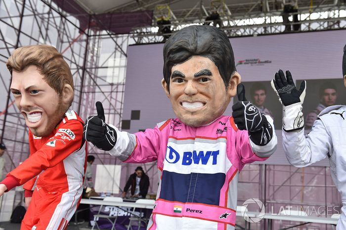 Guiñoles de Sebastian Vettel, Ferrari, Sergio Perez, Force India