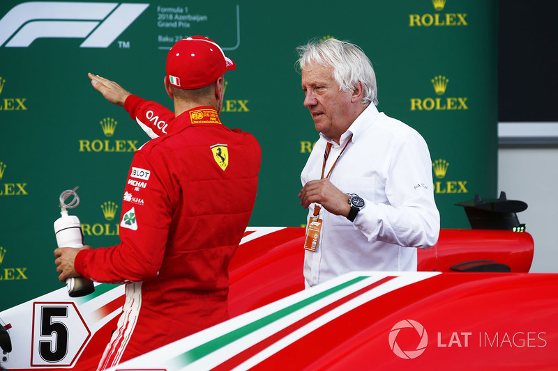 Sebastian Vettel, Ferrari, talks with Charlie Whiting, Race Director, FIA