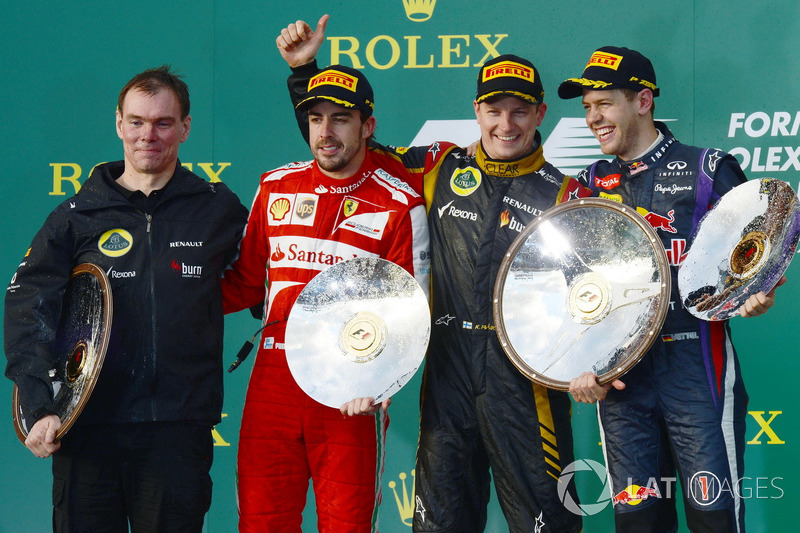 Podium: Alan Permane, Lotus F1 Team Race Engineer, second place Fernando Alonso, Ferrari, race winner Kimi Raikkonen, Lotus F1 Team, third place Sebastian Vettel, Red Bull Racing