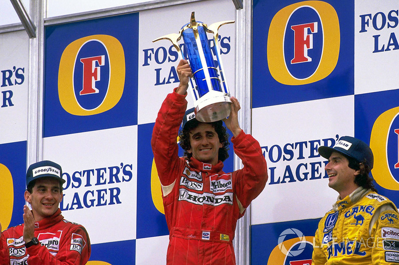 Podium: race winner Alain Prost, McLaren, second place Ayrton Senna, McLaren, third place Nelson Piq