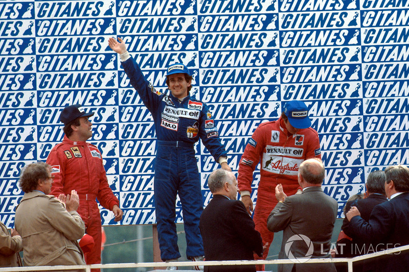 Podium: race winner Alain Prost, Renault, second place Patrick Tambay, Ferrari, third place Eddie Cheever, Renault