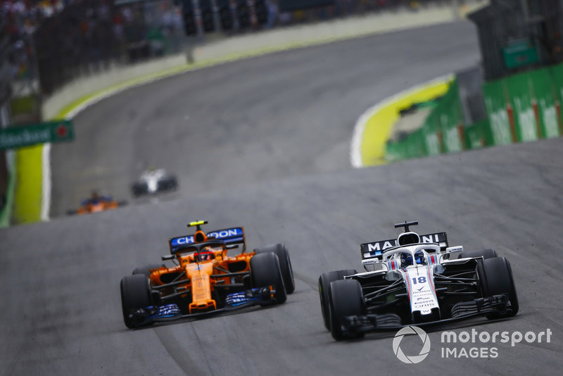 Lance Stroll, Williams FW41, leads Stoffel Vandoorne, McLaren MCL33