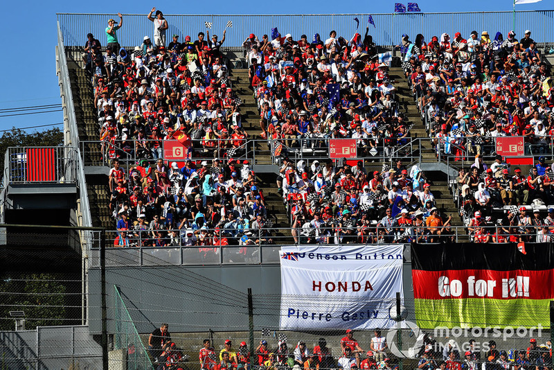 Pierre Gasly, Scuderia Toro Rosso fans and banner 