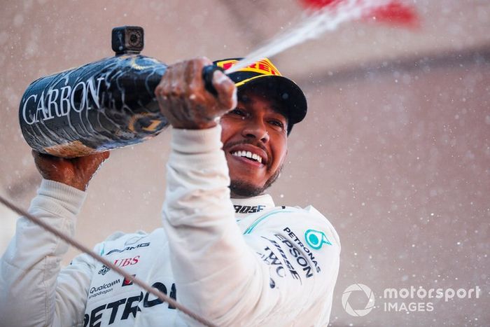 Lewis Hamilton, Mercedes AMG F1, 1st position, sprays Champagne on the podium