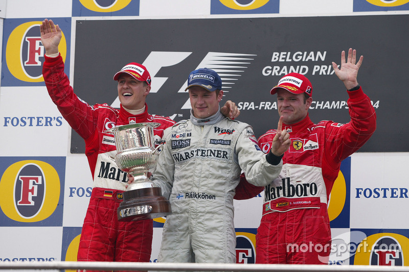 Podium: Race winner Kimi Raikkonen, Mc Laren; second place Michael Schumacher, Ferrari; third place Rubens Barrichello