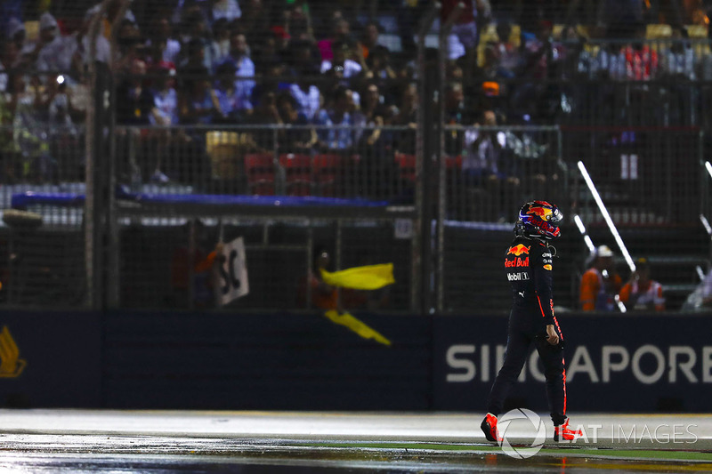 Max Verstappen, Red Bull, walks back to his garage