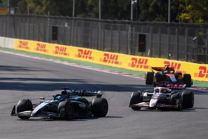 George Russell, Mercedes, Esteban Ocon, Haas F1 Team