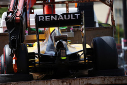 The Renault Sport F1 Team RS16 of Kevin Magnussen, Renault Sport F1 Team is recovered back to the pi