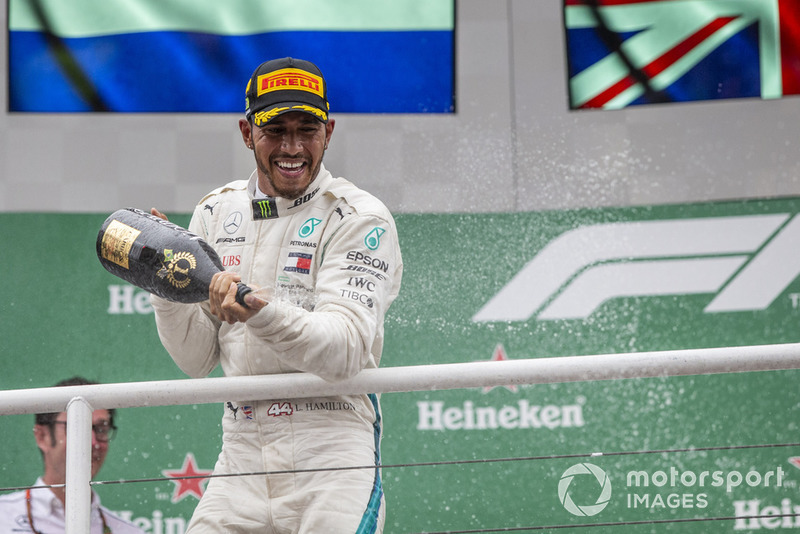 Lewis Hamilton, Mercedes AMG F1 celebrates on the podium with the champagne 