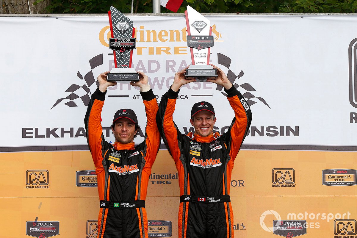 Junqueira celebrates with team-mate Chris Cumming after securing memorable last-lap IMSA LMPC win in 2015