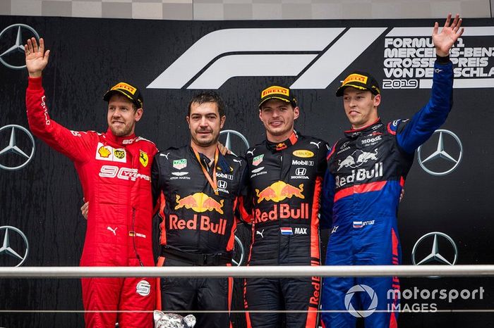 Sebastian Vettel, Ferrari, Race winner Max Verstappen, Red Bull Racing and Daniil Kvyat, Toro Rosso celebrate on the podium 