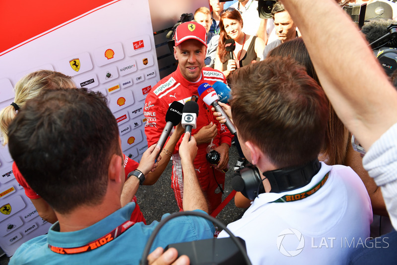 Sebastian Vettel, Ferrari talks with the media