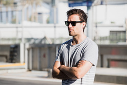 Jolyon Palmer watches his brother, Will Palmer, Arden International