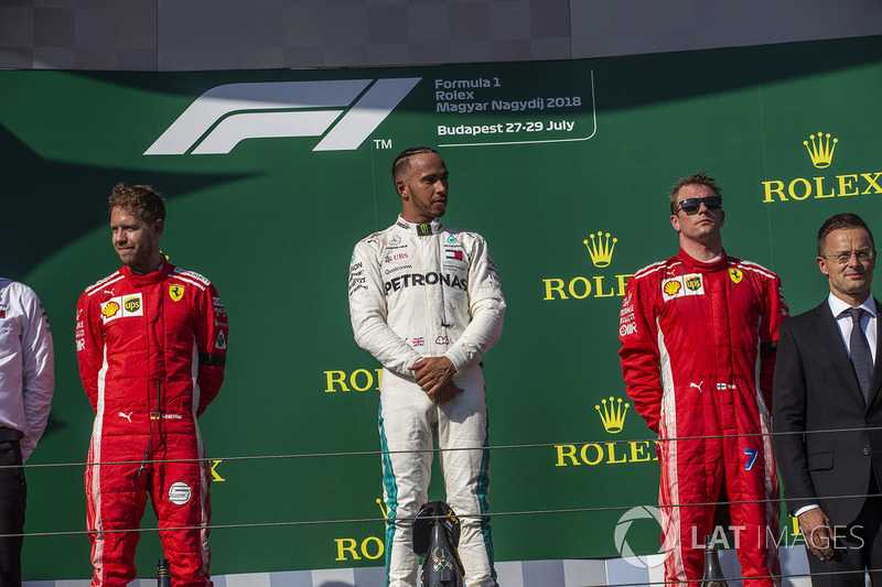 Sebastian Vettel, Ferrari, Lewis Hamilton, Mercedes-AMG F1 y Kimi Raikkonen, Ferrari en el podio