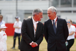 Chase Carey, Chairman, Formula One, talks to a dignitary