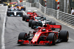 Sebastian Vettel, Ferrari SF71H, leads Lewis Hamilton, Mercedes AMG F1 W09, Kimi Raikkonen, Ferrari SF71H, Valtteri Bottas, Mercedes AMG F1 W09
