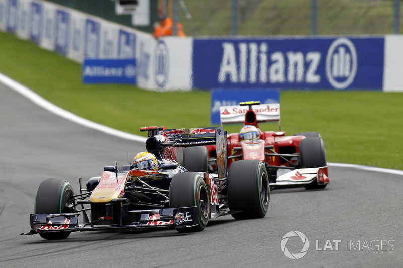 Sébastien Buemi, Toro Rosso STR5, leads Fernando Alonso, Ferrari F10