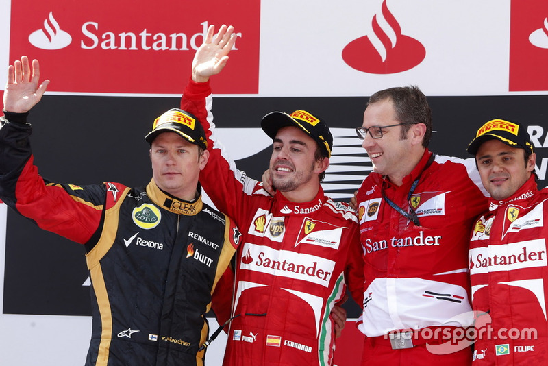 Podium: second place Kimi Raikkonen, Lotus F1, Race winner  Fernando Alonso, Ferrari, Stefano Domenicali, Team Principal, Ferrari, third place Felipe Massa, Ferrari