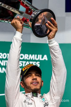 Race winner Lewis Hamilton, Mercedes AMG F1 celebrates on the podium
