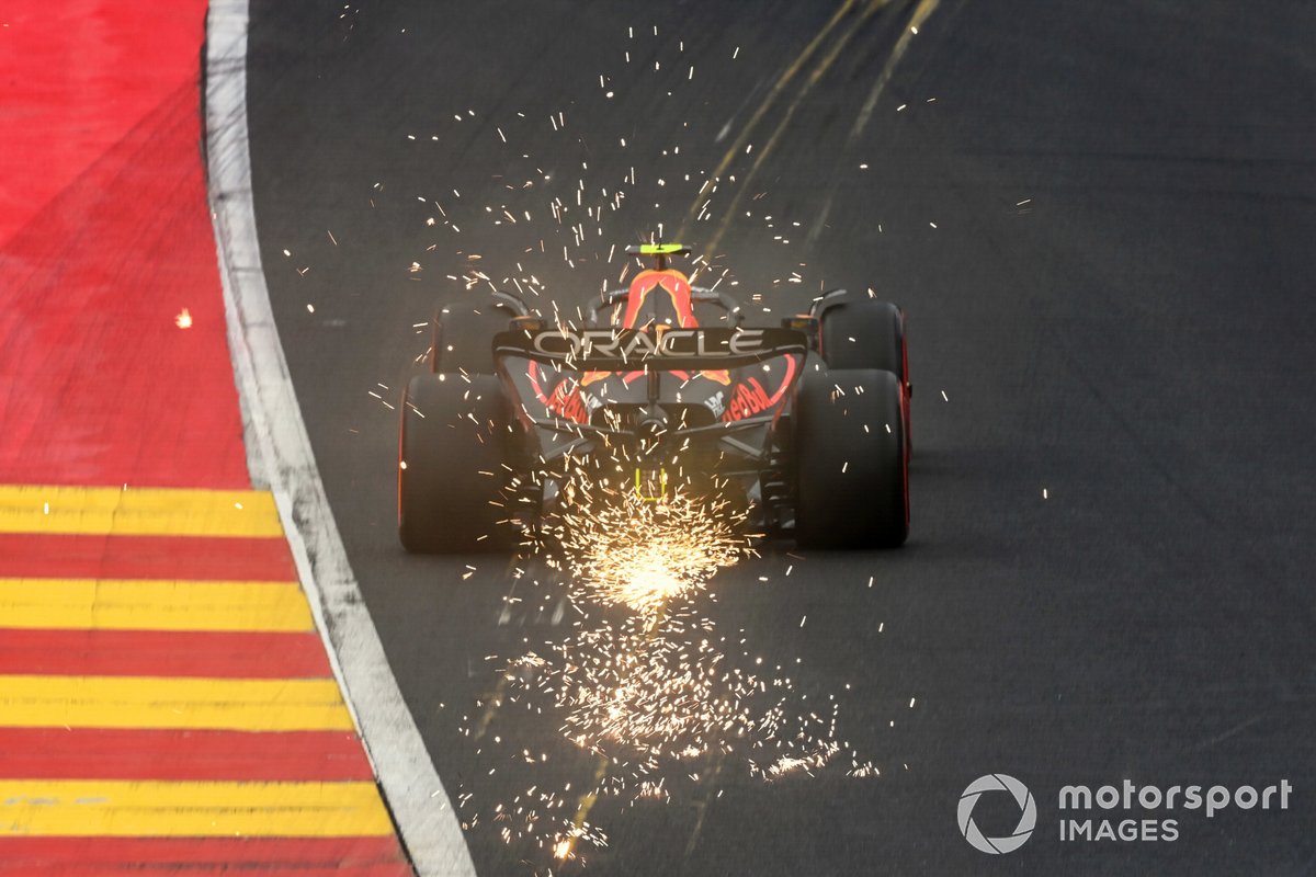 Sergio Perez, Red Bull Racing RB18, kicks up sparks