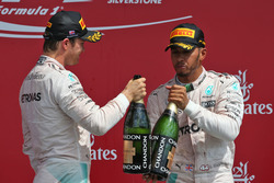 The podium (L to R): Nico Rosberg, Mercedes AMG F1 celebrates his second position with team mate and race winner Lewis Hamilton, Mercedes AMG F1
