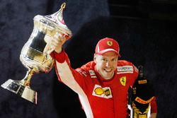 Sebastian Vettel, Ferrari, 1st position, celebrates with his trophy