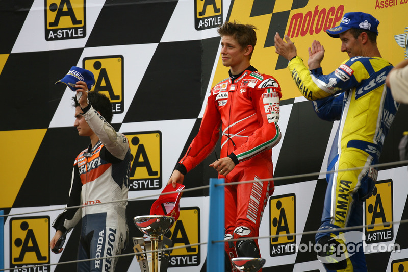 Podium: second place Dani Pedrosa; Winner Casey Stoner, Ducati; third place Colin Edwards, Yamaha