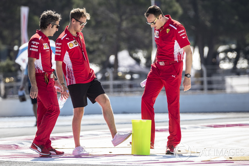 Sebastian Vettel, Ferrari walks the track