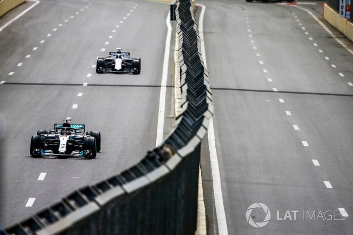 Lewis Hamilton, Mercedes AMG F1 W09, leads Lance Stroll, Williams FW41 Mercedes