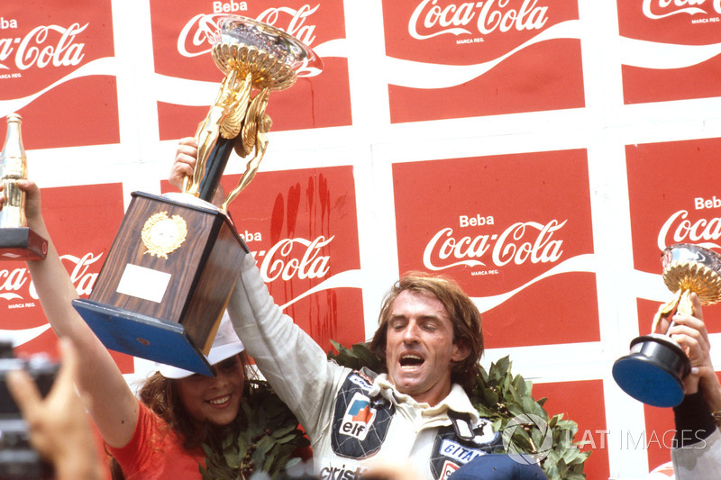 Podium: race winner Jacques Laffite, Ligier