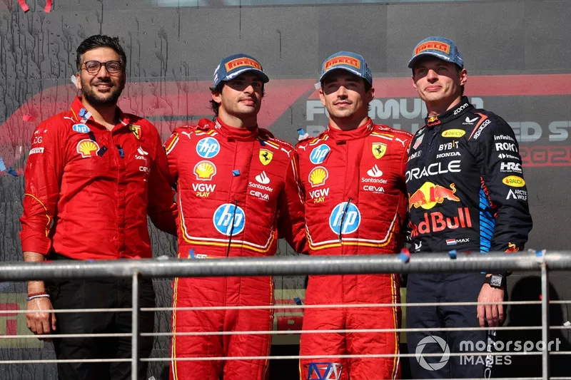 Charles Leclerc, Scuderia Ferrari, 1st position, Carlos Sainz, Scuderia Ferrari, 2nd position, Max Verstappen, Red Bull Racing, 3rd position, on the podium 