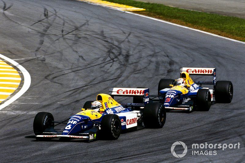 Riccardo Patrese, Williams FW14B Renault, leads Nigel Mansell, Williams FW14B Renault