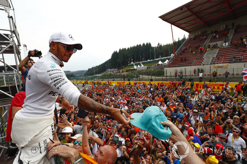 Race winner Lewis Hamilton, Mercedes AMG F1, celebrates with fans after the race
