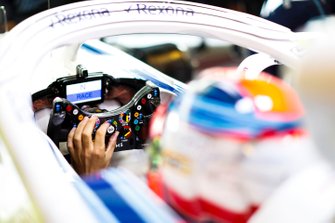 Robert Kubica, Williams Martini Racing, adjusts his steering wheel