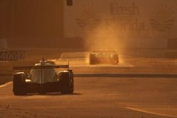 Track action at sunset