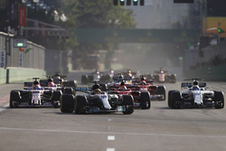 Lewis Hamilton, Mercedes AMG F1 W08, Sebastian Vettel, Ferrari SF70H, is passed by Felipe Massa, Wil